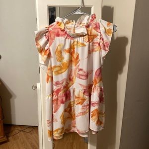Brand new feather ruffle tank